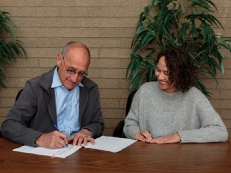 Director signing MOU